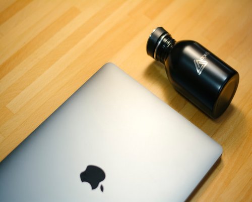 water bottle on a work desk in an office